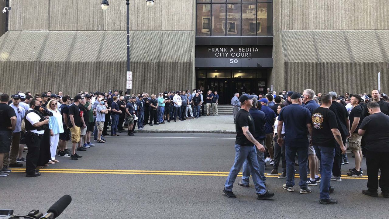 Supporters of two suspended Buffalo, New York, police officers assemble June 6 outside the courthouse.