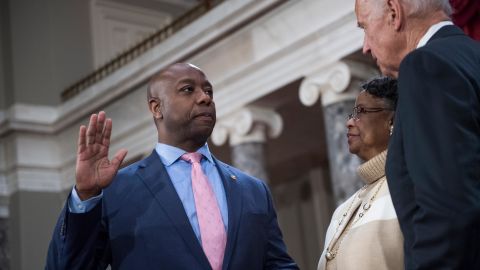 Sen. Tim Scott is administered an oath as his mother Frances looks on, by Vice President Joe Biden during a swearing-in ceremony in the Capitol's Old Senate Chamber on January 03, 2017. 