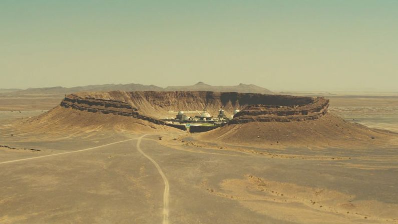 <strong>The Saharan crater facility, "SPECTRE" (2015) -- </strong>Forget global domination and ruining Bond's life, Blofeld's one true love may be geological phenomena. After a volcano in "You Only Live Twice" and a mountaintop in "OHMSS," Blofeld re-entered the series with a base inside a meteorite crater deep in the Sahara. The production spliced two locations together: The crater was really Gara Medouar, a horseshoe-shaped rock formation outside the oasis town of <a href="https://www.google.com/maps/place/Erfoud,+Morocco/@31.4551476,-4.3208474,32859m/data=!3m2!1e3!4b1!4m12!1m6!3m5!1s0xd979df5204ebfb5:0xdfc69f5288bab50b!2sGara+Medouar!8m2!3d31.3005959!4d-4.4000707!3m4!1s0xd977b2c5079550b:0xf04c523511a64215!8m2!3d31.4365725!4d-4.2343712?hl=en" target="_blank" target="_blank">Erfoud, Morocco</a>, while the residence was shot partly at Dar Bianca, a <a href="https://www.architecturaldigest.com/story/james-bond-home-for-sale-for-dollar43-million" target="_blank" target="_blank">contemporary villa in Marrakech</a> designed by Imaad Rahmouni. Bond being Bond, he cared not for its aesthetic pleasures and <a href="https://www.youtube.com/watch?v=PESfnbr9I58" target="_blank" target="_blank">blew up the place</a>, escaping Blofeld and creating an explosion so large special effects supervisor Chris Corbould <a href="https://www.guinnessworldrecords.com/news/2015/11/daniel-craig-accepts-certificate-for-largest-film-stunt-explosion-in-latest-bond-405307?fb_comment_id=1021260877908936_1021299937905030" target="_blank" target="_blank">broke a Guinness World Record</a>. Corbould reportedly used 8,418 liters of kerosene and 33 kilograms of powdered explosives to create a blast equivalent to nearly 70 metric tons of TNT.