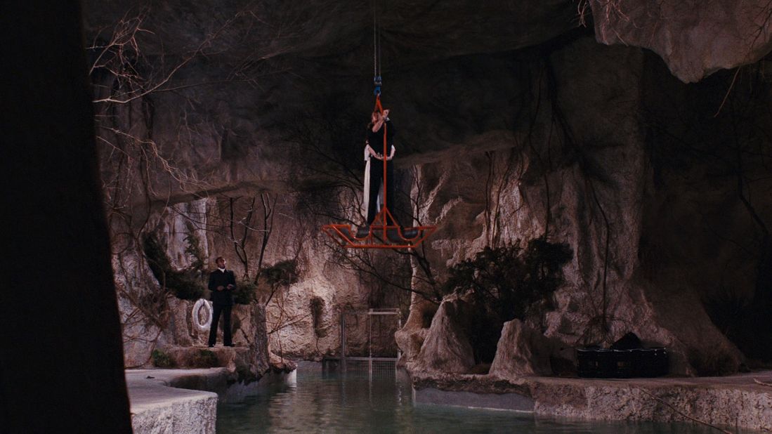 <strong>Kanaga's underground lair, "Live And Let Die" (1973) -- </strong>Dr. Kanaga, otherwise known as Mr Big, was head of the government of fictional Caribbean island San Monique in Roger Moore's first outing as Bond. Kanaga's lair beneath a church cemetery sees the return of the shark-filled pool, which Bond and Kanaga wrestle in before Bond forces him to swallow a carbon dioxide cartridge, causing the drug trafficker to inflate up and out of the pool <a href="https://www.youtube.com/watch?v=JetaIVyl6zs" target="_blank" target="_blank">before exploding</a>. <br /><br />The Green Grotto Caves of Runaway Bay, Jamaica -- a popular tourist site -- were used for some shots, while the interiors of the lair (including the pool) were <a href="https://www.amazon.co.uk/007-Diaries-Filming-Live-Let/dp/0750987596?asin=0750987596&revisionId=&format=4&depth=1" target="_blank" target="_blank">built at Pinewood Studios in the UK</a>.<br />