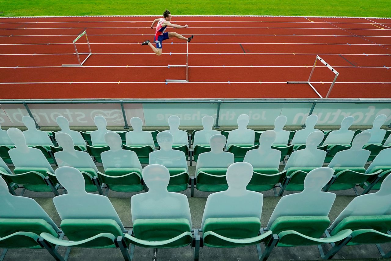 Cardboard cutouts are seen in the stands of Bislett Stadium as Karsten Warholm runs a hurdles race in Oslo, Norway, on Thursday, June 11. <a href="https://olympics.nbcsports.com/2020/06/11/karsten-warholm-world-record-impossible-games/" target="_blank" target="_blank">Warholm ran the fastest 300-meter hurdles race in history</a> during the Impossible Games, a repurposed Diamond League meet.