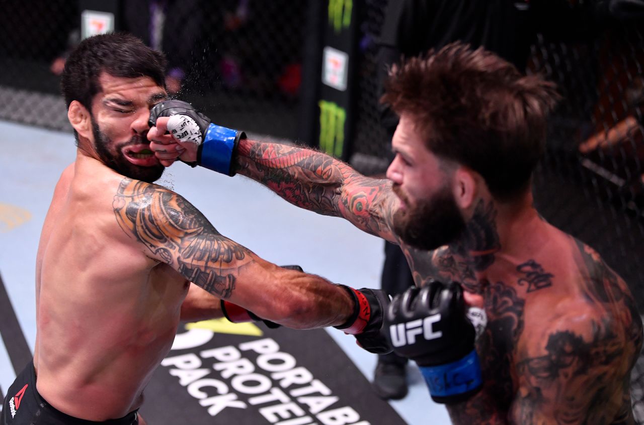 Cody Garbrandt punches Raphael Assuncao during their UFC bout in Las Vegas on Saturday, June 6. Garbrandt knocked out Assuncao in the second round.