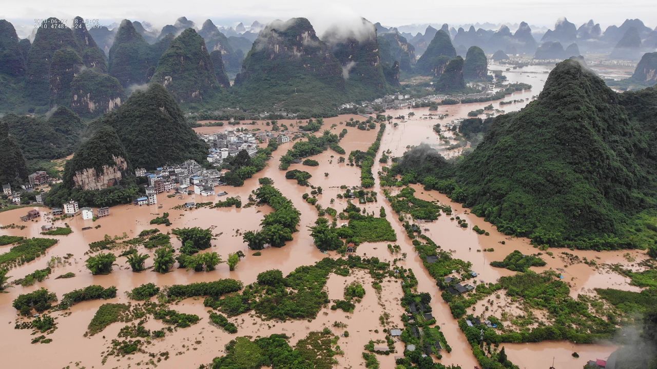 Streets and buildings are submerged Sunday, June 7, after heavy rain caused flooding in Yangshuo, China.