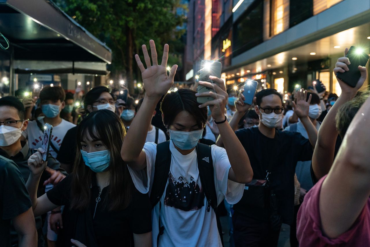 People take part in a rally in Hong Kong on Tuesday, June 9. It had been a year since pro-democracy protesters <a href="https://www.cnn.com/2019/06/09/world/gallery/hong-kong-extradition-protest/index.html" target="_blank">took the streets</a> to voice their opposition to a proposed extradition bill.