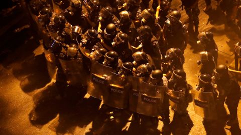 Riot police advance in downtown Beirut, Lebanon on June 11, 2020.