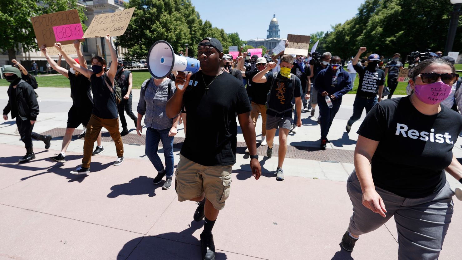 Denver School Board At-Large Director Tay Anderson direct participants during a protest over the death of George Floyd.