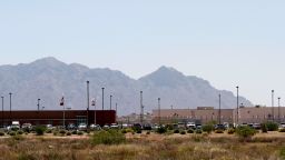 Vehicles are parked outside the La Palma Correctional Center in Eloy, Arizona