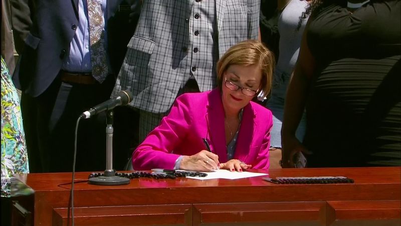 Kim Reynolds, Iowa Governor, Signs Police Reform Bill That Was Passed ...