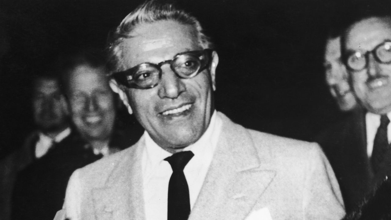 <strong>Aristotle Onassis: </strong>Onassis is pictured after arriving into London's Gatwick Airport in 1959, having flown to the UK on Olympic Airways with Prince Rainier and Princess Grace of Monaco. 
