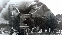 FILE - In this 1921 file image provided by the Greenwood Cultural Center via Tulsa World, Mt. Zion Baptist Church burns after being torched by white mobs during the 1921 Tulsa massacre. Black community and political leaders called on President Donald Trump to at least change the Juneteenth date for a rally kicking off his return to public campaigning, saying Thursday, June 11, 2020. From Sen. Kamala Harris of California to Tulsa civic officials, black leaders said it was offensive for Trump to pick that date — June 19 — and that place — Tulsa, an Oklahoma city that in 1921 was the site of a fiery and orchestrated white-on-black killing spree. (c)