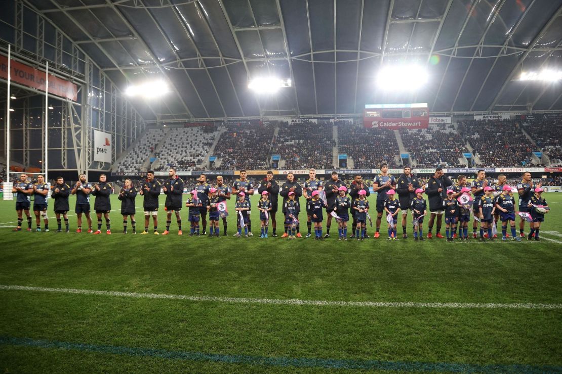The Otago Highlanders team line up before the start of the game at the Forsyth Barr Stadium in Dunedin, the first since Covid-19 restrictions were largely lifted in New Zealand.