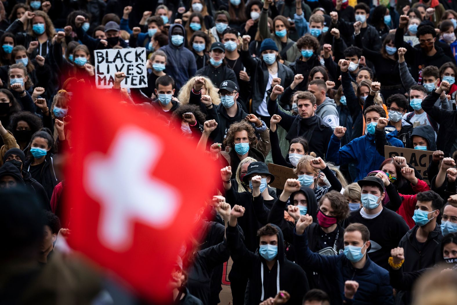 People demonstrate against racism during a protest on June 13 in Lausanne, Switzerland.