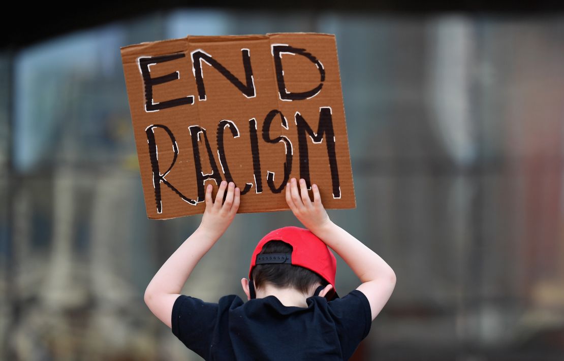 Families participate in a children's march in solidarity with the Black Lives Matter movement and national protests against police brutality in June in Brooklyn.