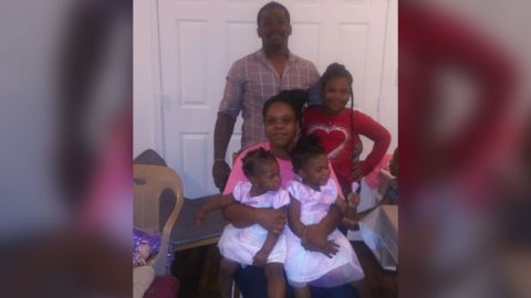Rayshard Brooks pictured with his three daughters and their mother.