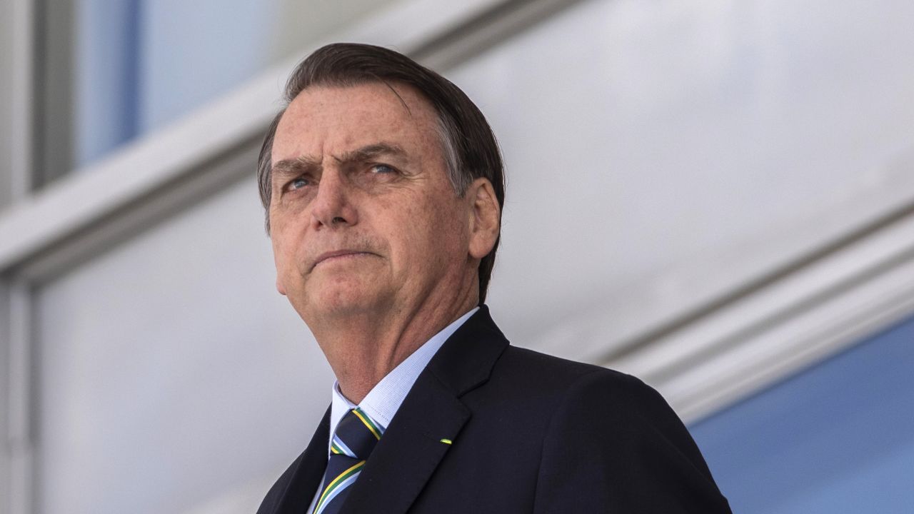 Brazil's President Jair Bolsonaro, welcomes Paraguay's President Mario Abdo Benitez (out of frame) at Planalto palace in Brasilia on March 12, 2019. (Photo by Sergio LIMA / AFP)        (Photo credit should read SERGIO LIMA/AFP via Getty Images)