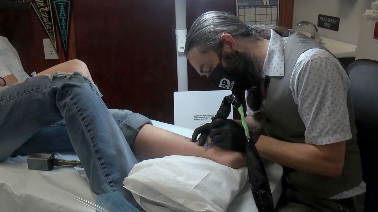 Ryun King covering up a confederate tattoo.