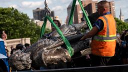 A statue of Christopher Columbus, which was toppled by protesters, is loaded onto a truck on the grounds of the State Capitol on June 10, 2020 in St Paul, Minnesota.