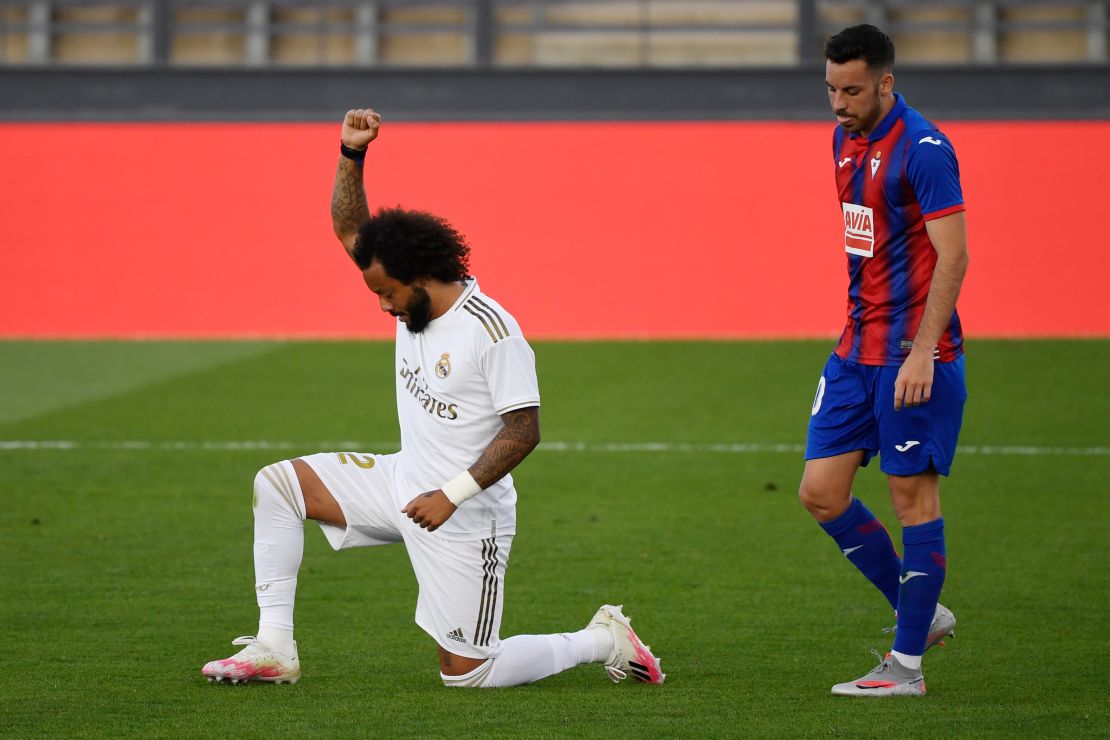 Marcelo knelt on one knee and raised his fist in a sign of solidarity with the Black Lives Matter movement after scoring Real's third goal.
