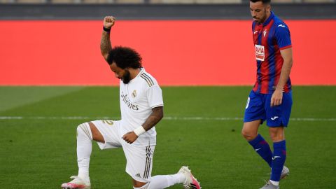 Marcelo knelt on one knee and raised his fist in a sign of solidarity with the Black Lives Matter movement after scoring Real's third goal.