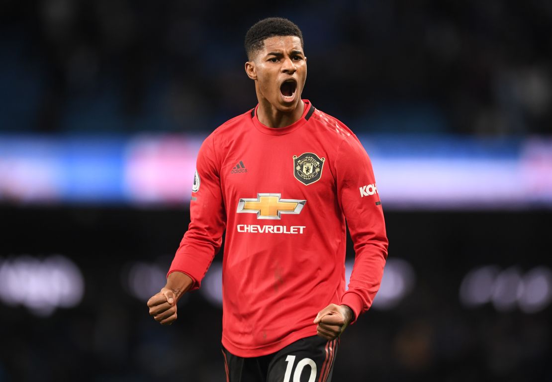 Marcus Rashford celebrates following Manchester United's victory against City in December.