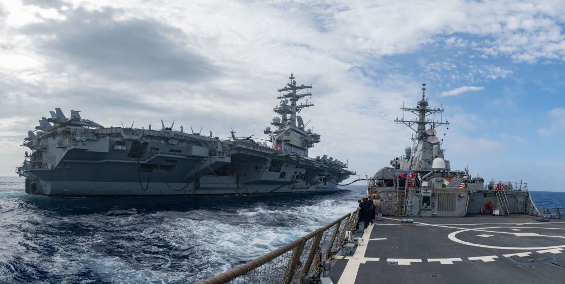 The  guided-missile destroyer USS Barry operates with the aircraft carrier USS Ronald Reagan in the Philippine Sea on May 30.