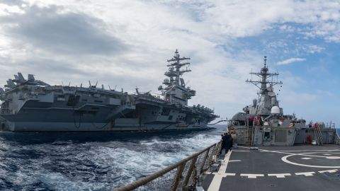The guided-missile destroyer USS Barry operates with the aircraft carrier USS Ronald Reagan in the Philippine Sea on May 30.
