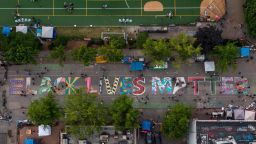 SEATTLE, WA - JUNE 14: An aerial view of a Black Lives Matter mural on East Pine Street near Cal Anderson Park is seen during ongoing Black Lives Matter events in the so-called  "CHOP," an area that protesters have called both the "Capitol Hill Occupied Protest" and the "Capitol Hill Organized Protest, on June 14, 2020 in Seattle, Washington. Black Lives Matter protesters have continued demonstrating in what was first referred to as the Capitol Hill Autonomous Zone, which encompasses several blocks around the Seattle Police Departments vacated East Precinct. (Photo by David Ryder/Getty Images)