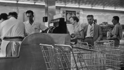 Waiting in line at the checkout in a supermarket circa 1960. (Photo by Herbert/Archive Photos/Getty Images)