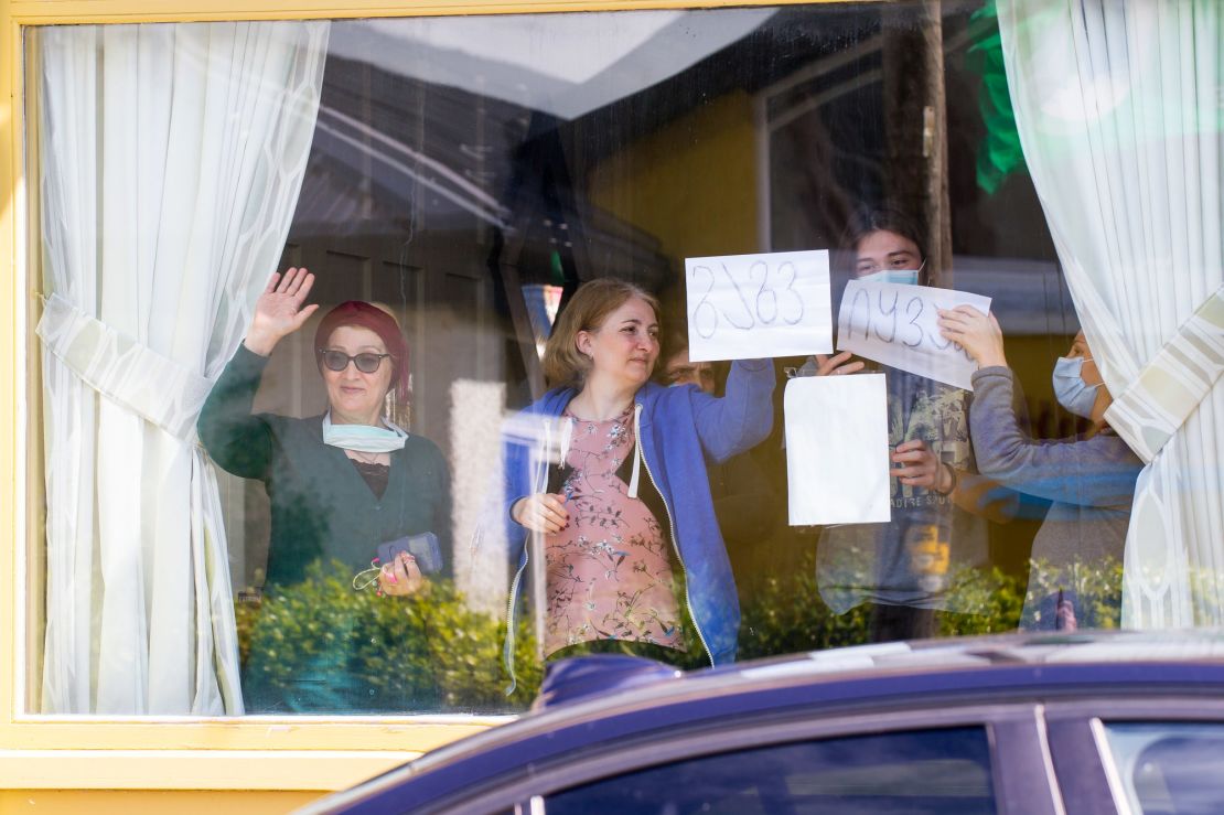 Skellig Star residents in quarantine wave to locals protesting outside on May 7.