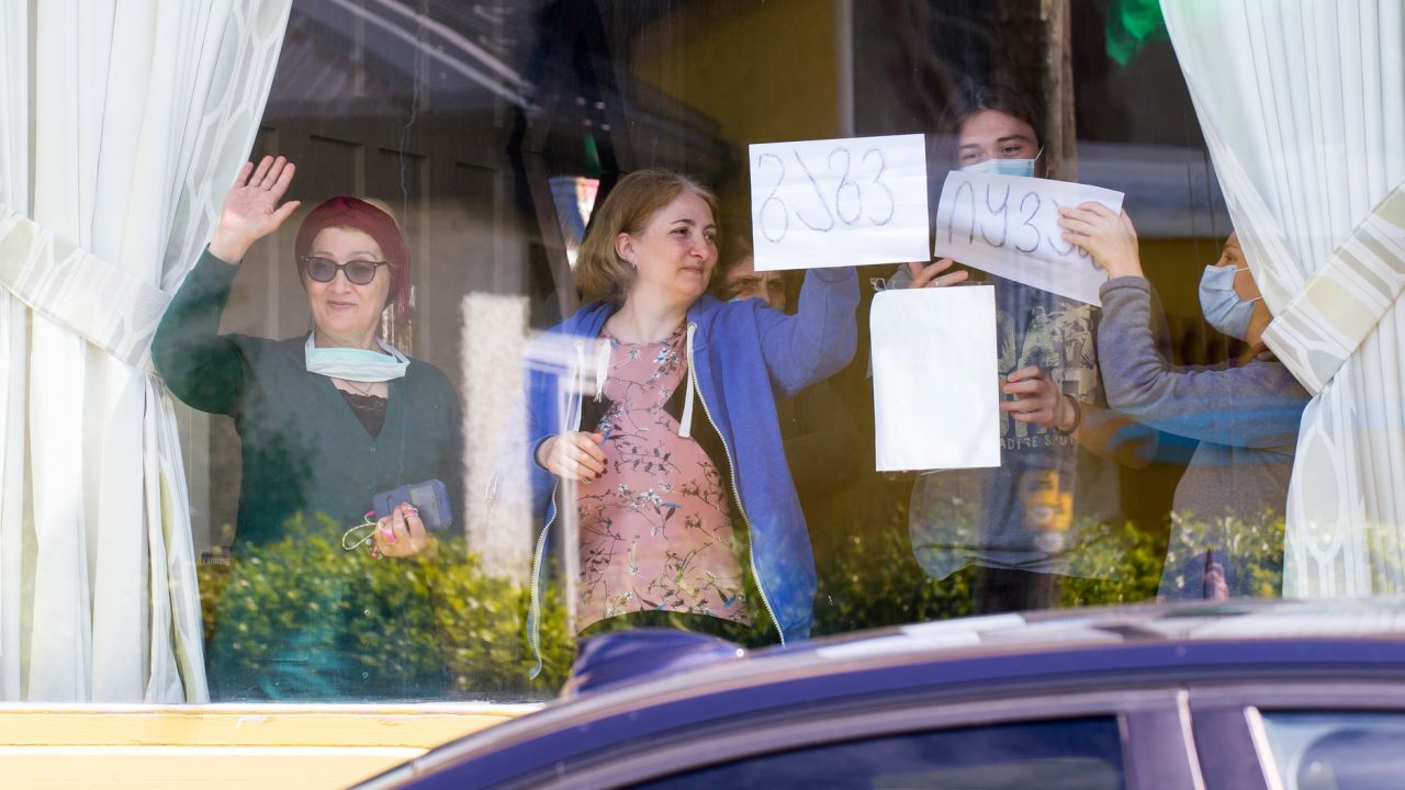 Skellig Star residents in quarantine wave to locals protesting outside on May 7.