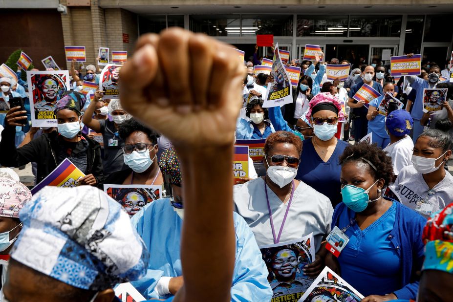 Members of the 1199SEIU union, the nation's largest union of health-care workers, kneel for eight minutes and 46 seconds during a vigil at the Brookdale Hospital Medical Center in New York. Eight minutes and 46 seconds is how long the police officer in Minneapolis held his knee on George Floyd's neck.