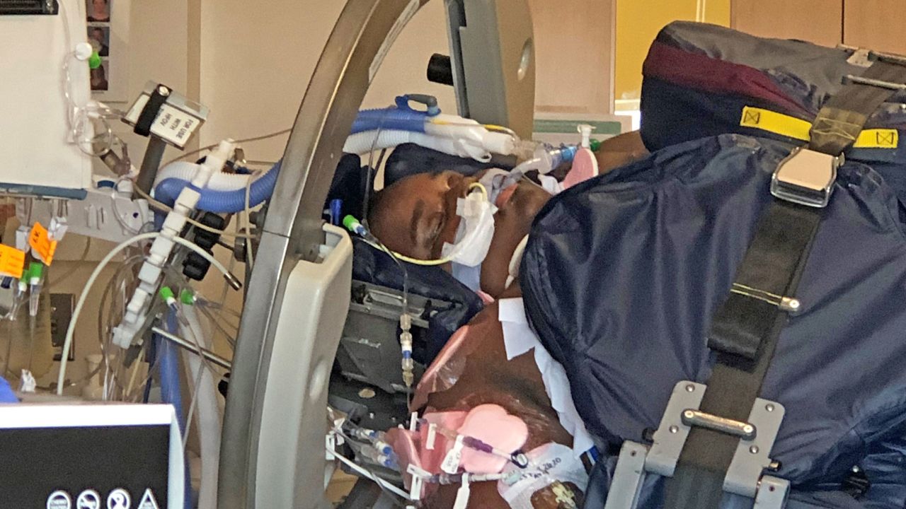Andre's doctors tried "proning" ― placing him flat on his stomach, face and chest down ― to improve his lung capacity. (Courtesy of the Guest family)