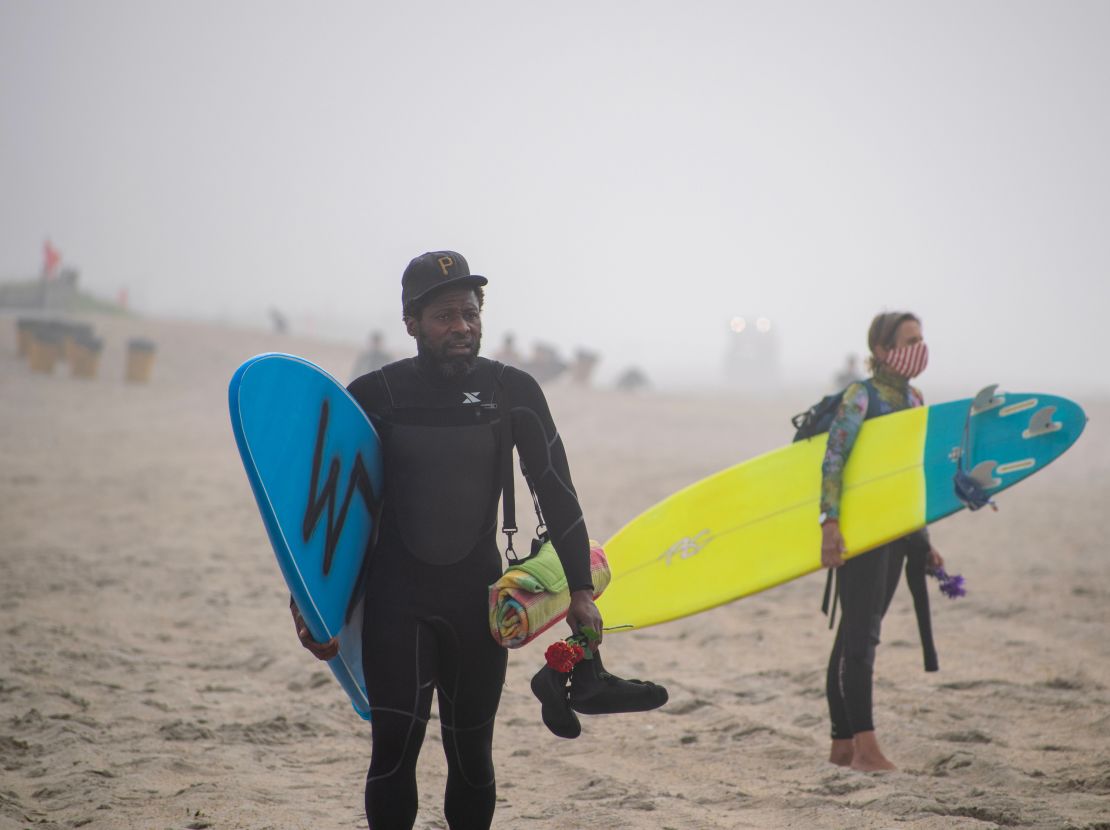 Hundreds of surfers paddle out to protest police brutality and honor ...