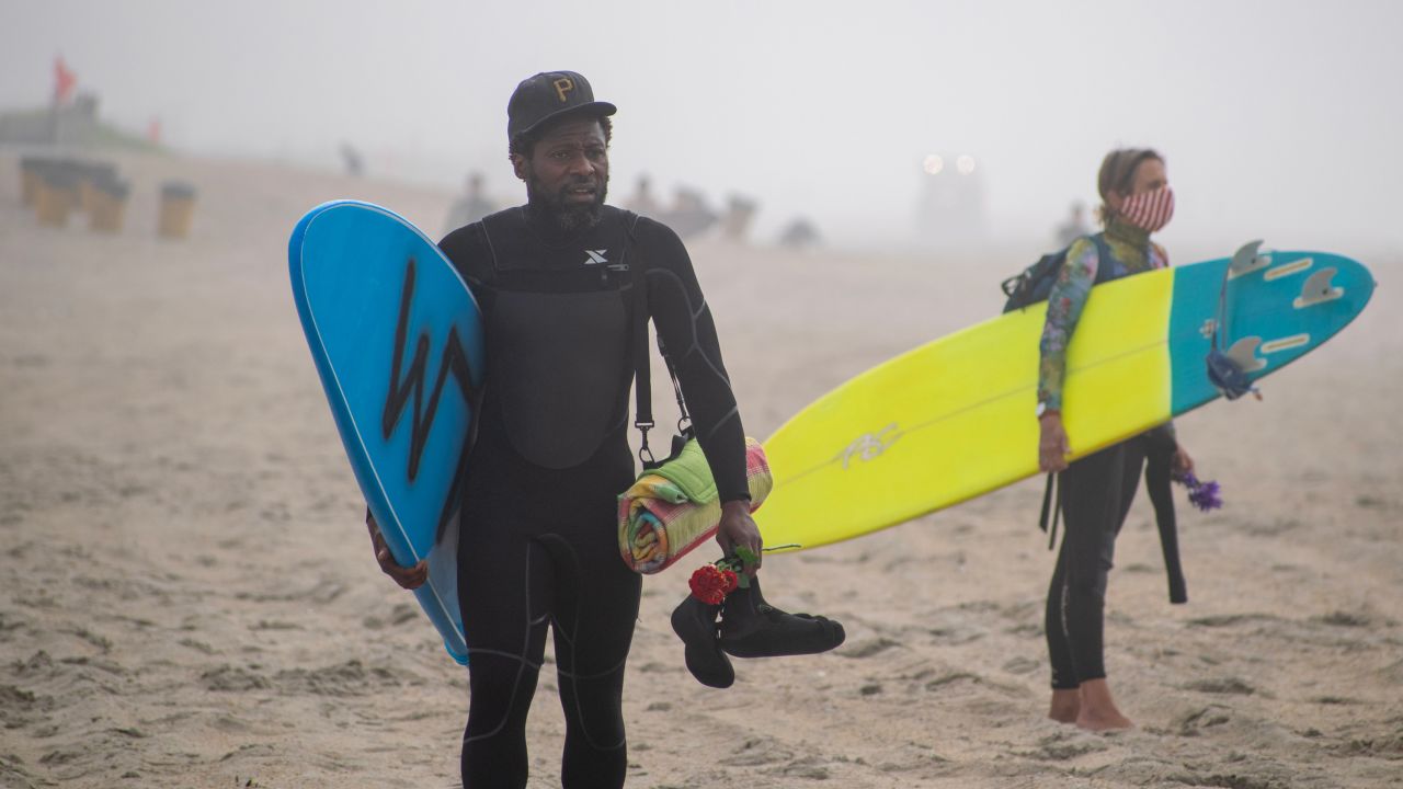 Hundreds of surfers paddle out to protest police brutality and honor ...