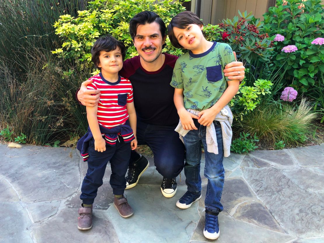 Juan Elias, shown here with (from left) sons Sebastian, 4, and Oliver, 7, has become their primary caregiver amid the coronavirus pandemic.