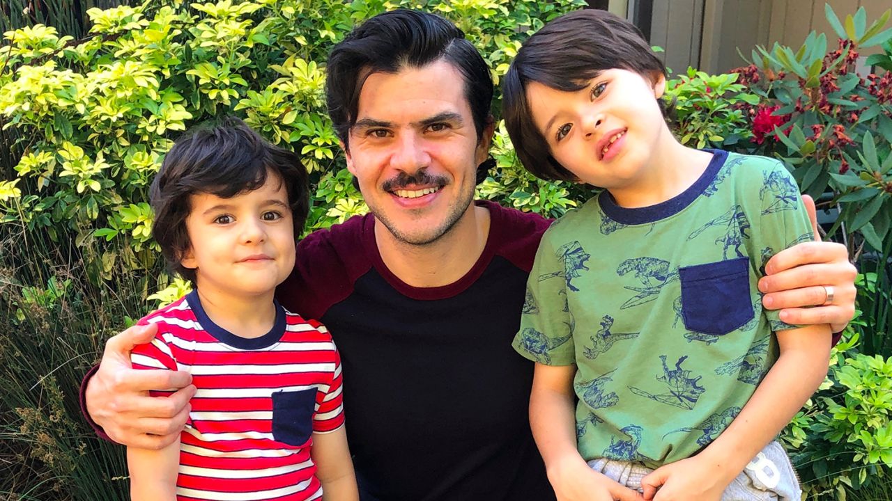 Juan Elias, shown here with (from left) sons Sebastian, 4, and Oliver, 7, has become their primary caregiver amid the coronavirus pandemic. 