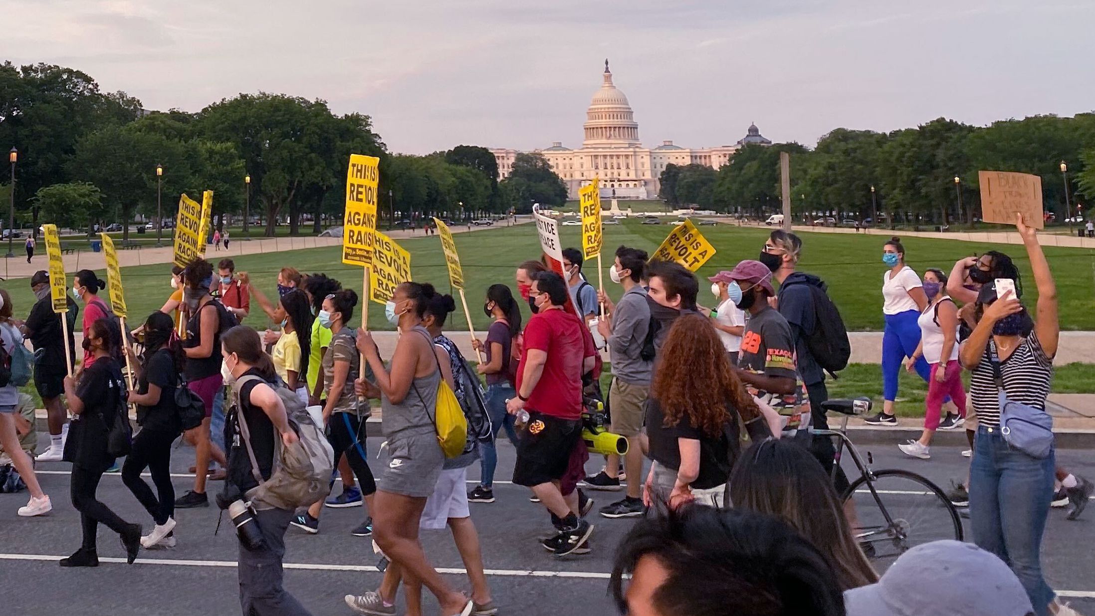 Protesters march around the National Mall in downtown Washington DC, on Monday, June 15, 2020. 