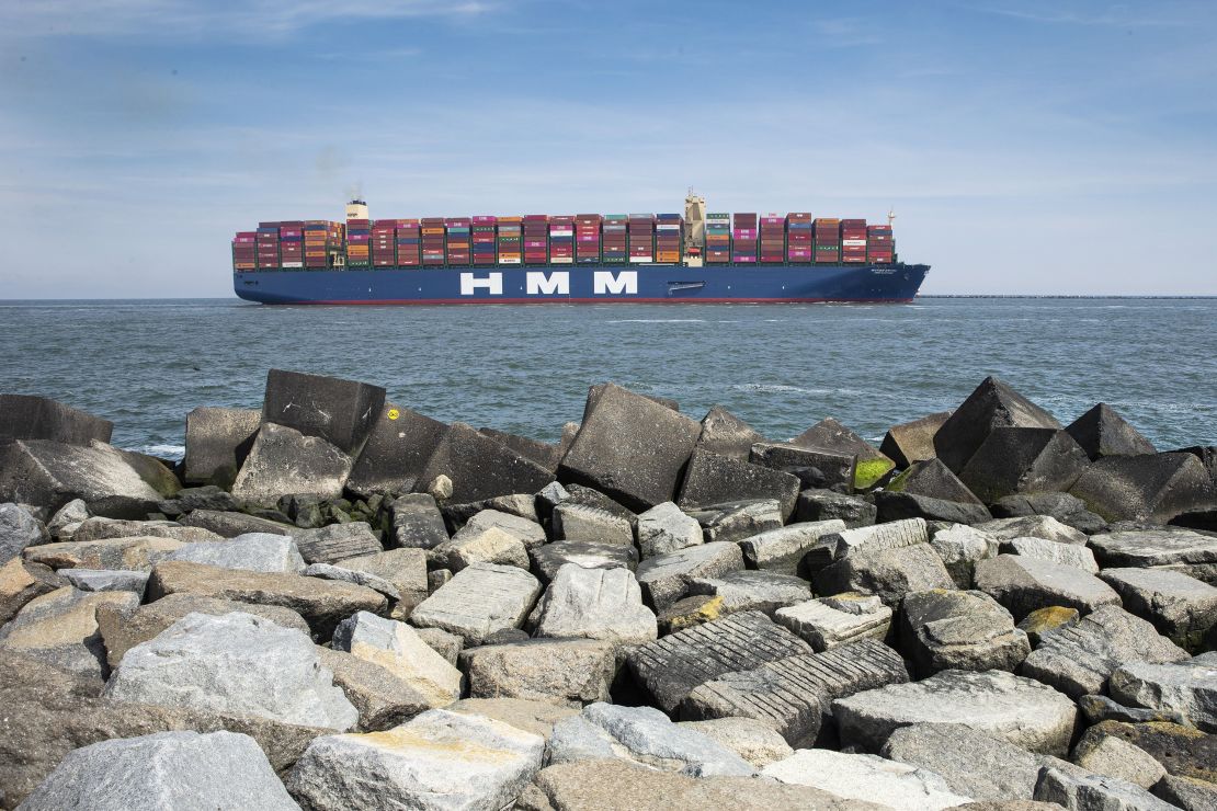 The world's largest container vessel, HMM Algeciras, approaches the port of Rotterdam.