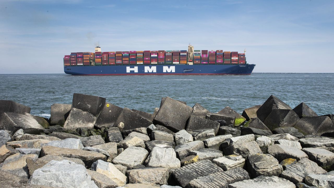 The world's largest container vessel, HMM Algeciras, approaches the port of Rotterdam.