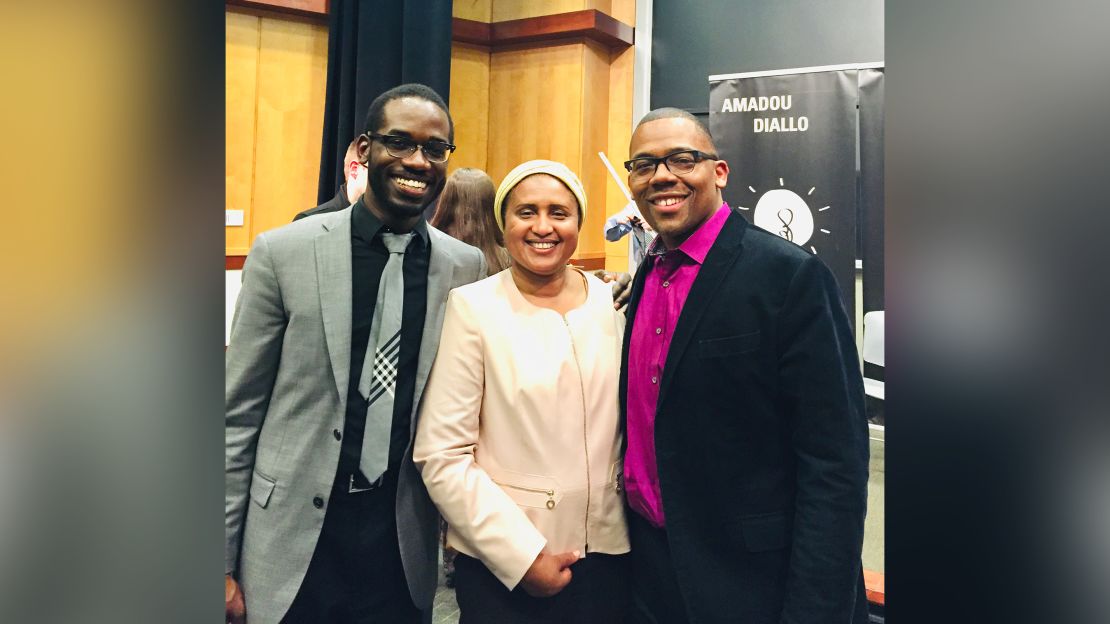 Joel Thompson (left), Eugene Rogers (right), and Kadijatou Diallo, the mother of Amadou Diallo, who was killed by police officers in 1999.