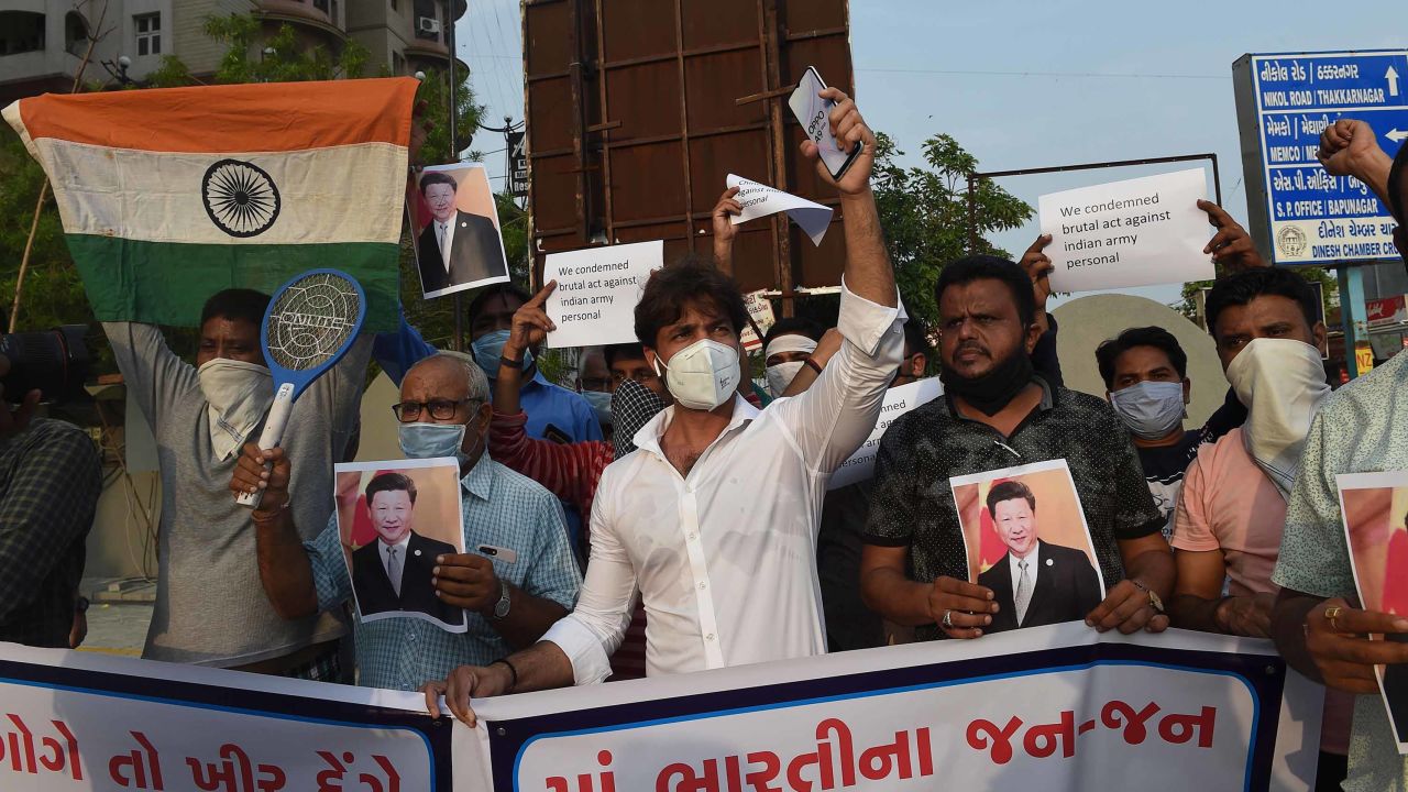 Demonstrators hold placards and shout slogans as they protest against the killing of three Indian soldiers by Chinese troops, in Ahmedabad, India on June 16, 2020.