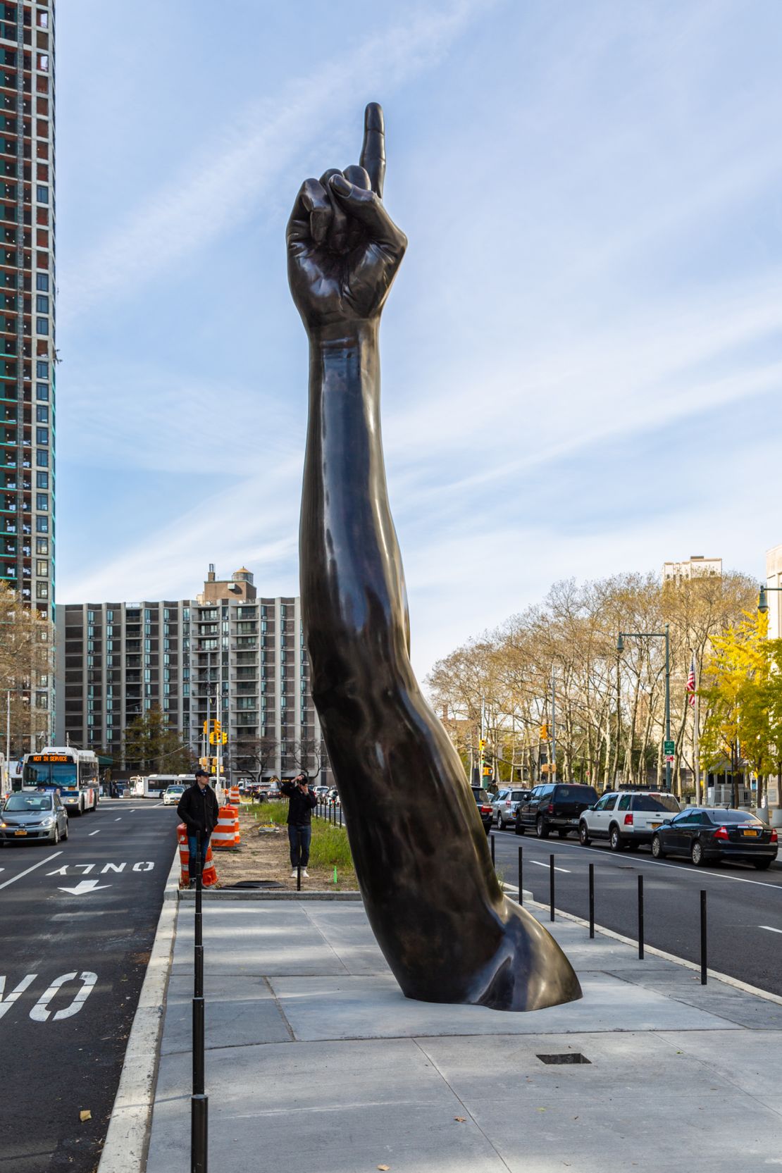 "Unity," which Willis Thomas created in 2019, sits at the foot of the Brooklyn Bridge, with a gesture reminiscient of the Statue of Liberty.