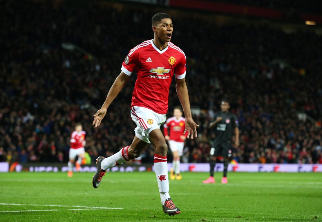 Rashford celebrates scoring on his United debut, against FC Midtjylland in the Europa League at Old Trafford on February 25, 2016.