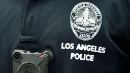 A Los Angeles Police Department officer wears a body camera at the  Los Angeles Gay Pride Resist March, June 11, 2017 in Hollywood, California.    / AFP PHOTO / Robyn Beck        (Photo credit should read ROBYN BECK/AFP via Getty Images)