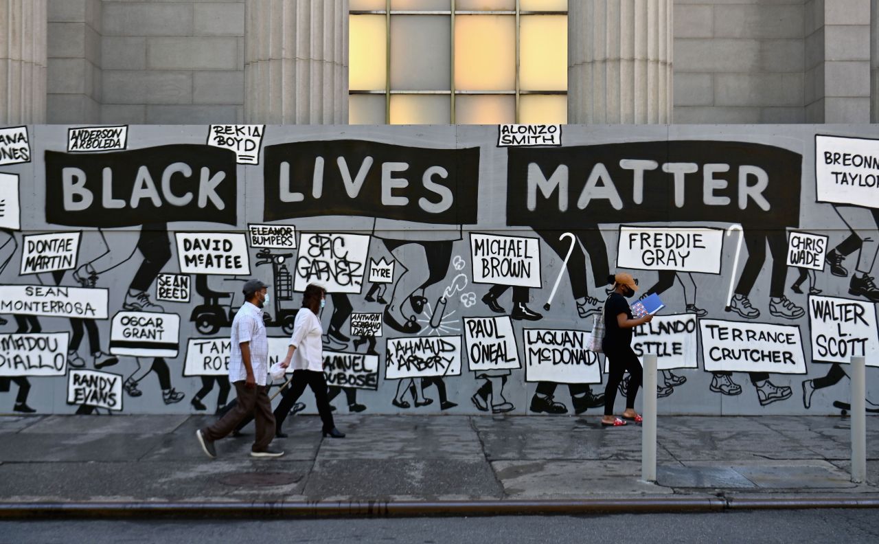 People walk past a Black Lives Matter mural at New York's Union Square on June 12.