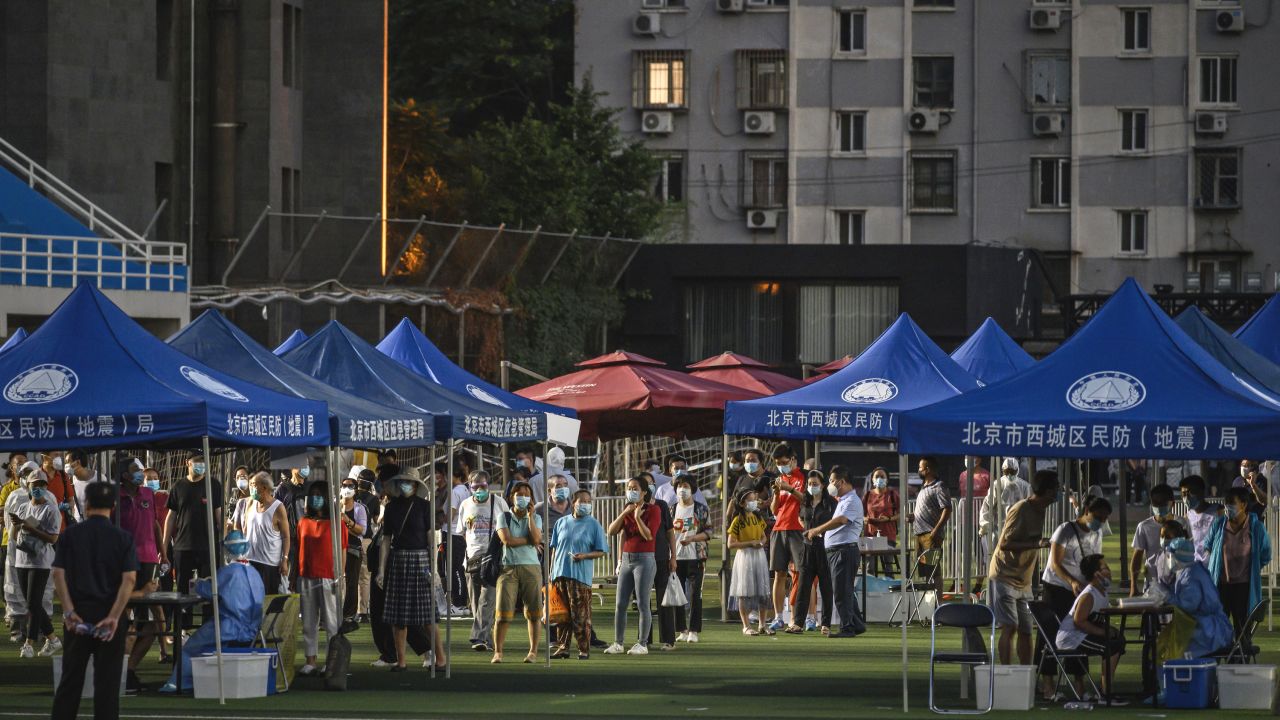 Residents line up at a makeshift coronavirus testing center in Beijing on June 15.