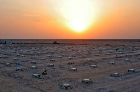 The sun sets over a cemetery for coronavirus victims near Najaf, Iraq.
