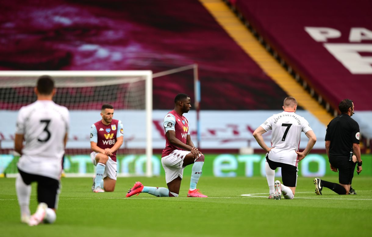 Professional soccer players from Aston Villa and Sheffield United show their support for the Black Lives Matter movement, taking a knee as their match kicked off in Birmingham, England, on Wednesday, June 17. Premier League teams are also sporting the words "Black Lives Matter" on the back of their jerseys as <a href="https://www.cnn.com/2020/06/17/football/premier-league-restart-manchester-city-arsenal-aston-villa-sheffield-united-spt-intl/index.html" target="_blank">play resumes following a 100-day layoff.</a>