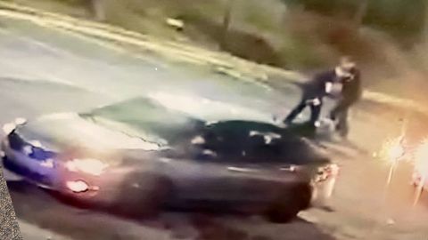 Officer Devin Brosnan is seen in this still image standing on Rayshard Brooks after he was shot, Fulton County District Attorney Paul Howard said.
