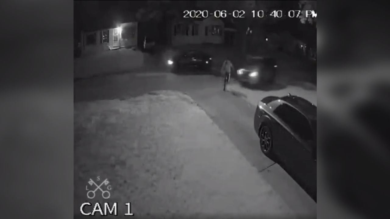 Moments before an unmarked police car hits man who jumped out of another vehicle.